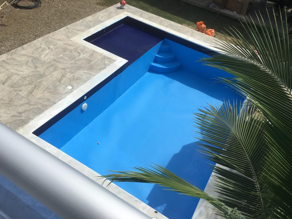 Piscina en L
